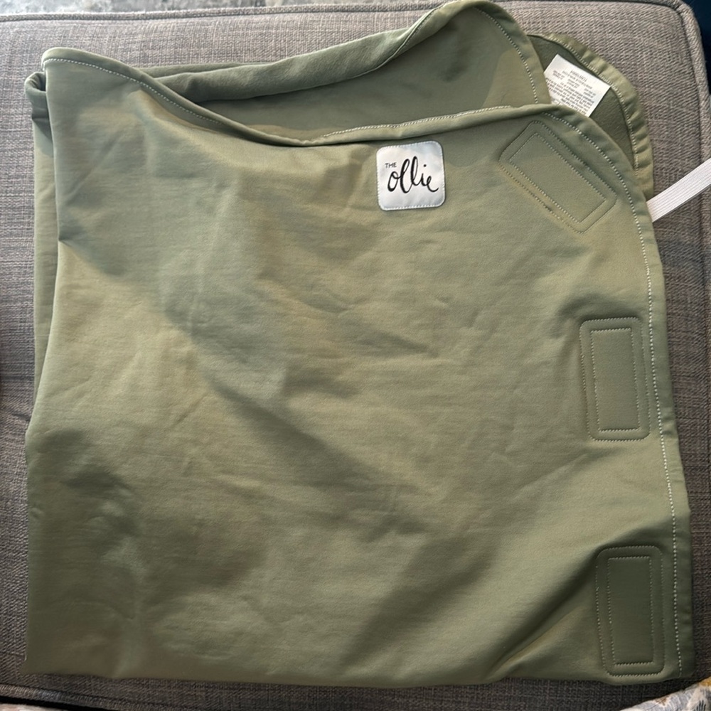 Green Ollie swaddle. Washed but never used.